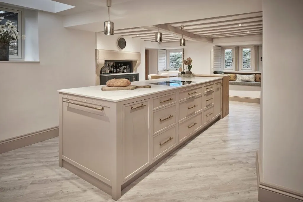 Dusty pink kitchen island in kitchen