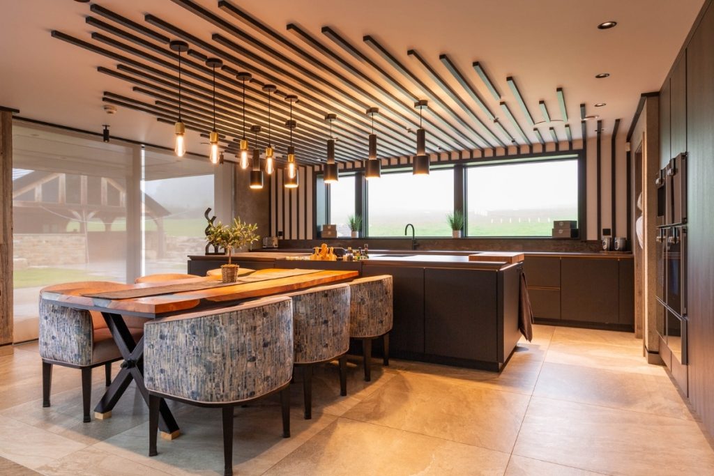 A statement kitchen with a kitchen island and a ceiling feature